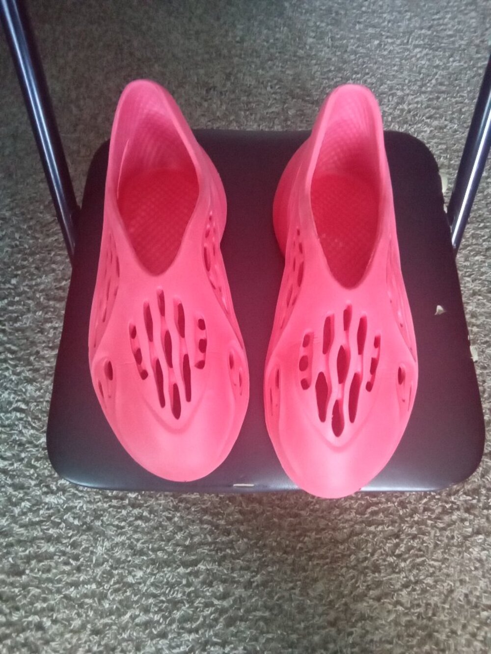 The product is a size 11 adidas Yeezy Foam Runner Vermillion sneaker